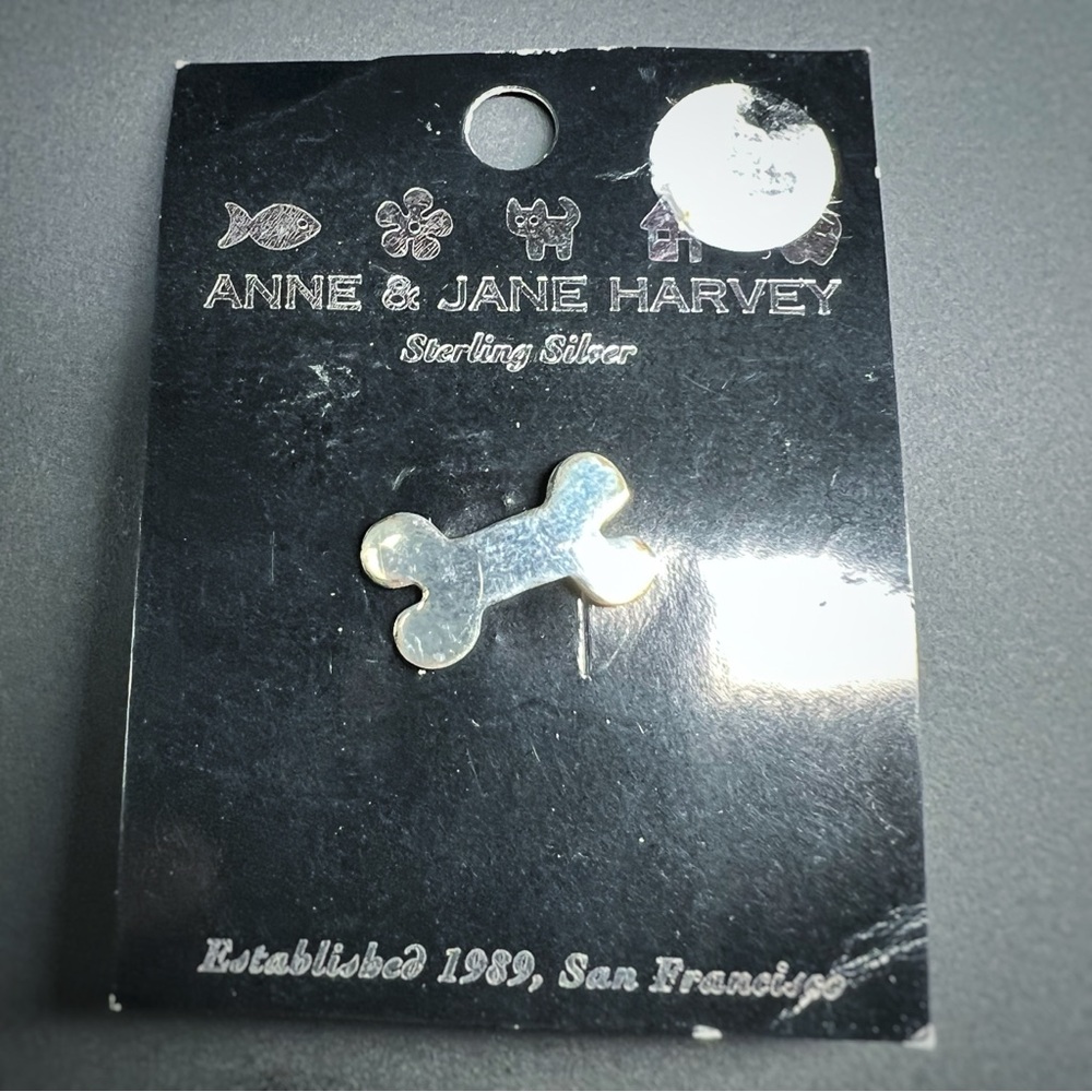 Vintage Anne & Jane Harvey Small Dog Bone Sterling Silver Pin. On original card.